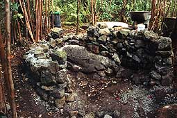 [Partially completed rock walls - inside view]