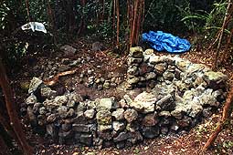 [Partially completed rock walls - outside view]